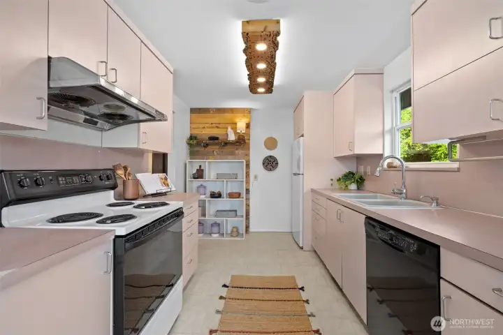 Extra wide, vintage chic kitchen.