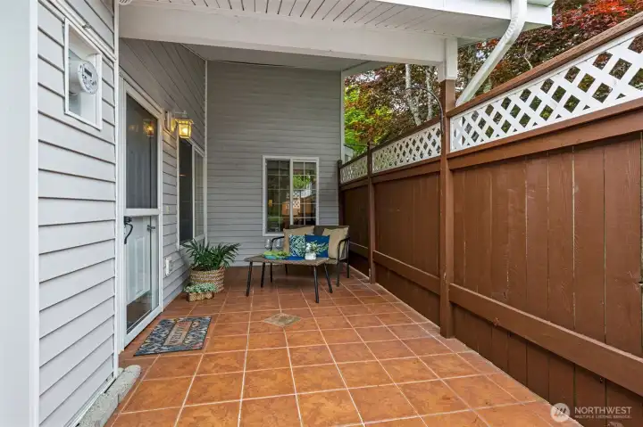Create your own outdoor paradise on this ceramic tile patio, partially covered for easy entertaining, yet with an open overhead area too , creating light for growing your container garden or flowering pots. Create your own outdoor paradise on this ceramic tile patio, partially covered for easy entertaining, yet with an open overhead area too , creating light for growing your container garden or flowering pots.