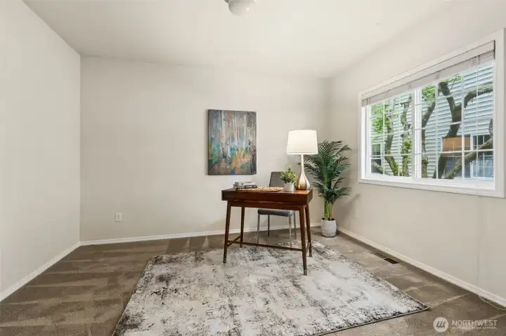Fill the large wall space in the den with your collection, photos and memorabilia, or bookshelves. Plenty of space for a big screen too for movies or game-day viewing. Faux,white-painted wood blind window coverings included. Fill the large wall space in the den with your collection, photos and memorabilia, or bookshelves. Plenty of space for a big screen too for movies or game-day viewing. Faux,white-painted wood blind window coverings included.