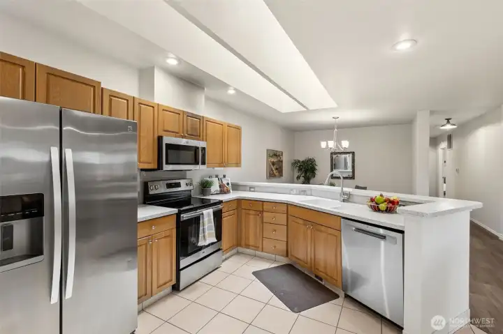 The work "triangle" in the kitchen is well deigned. Fit your favorite stools up to the bar height eating counter so fans can watch the cook create! Great design for entertaining or a solo perforance. The work "triangle" in the kitchen is well deigned. Fit your favorite stools up to the bar height eating counter so fans can watch the cook create! Great design for entertaining or a solo perforance.
