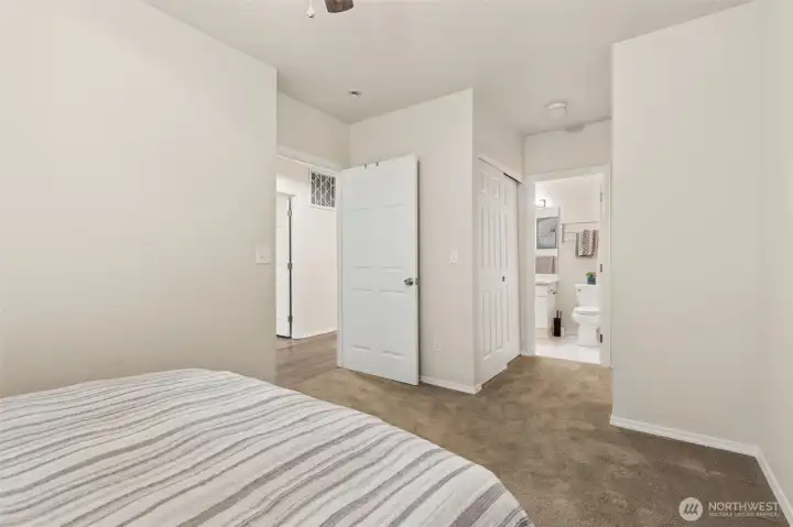 The secondary bedroom enjoys two large, deep closets and private access to the secondary full bath. The secondary bedroom enjoys two large, deep closets and private access to the secondary full bath.