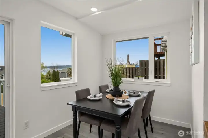Lovely eat-in dining area with beautiful views creates the perfect setting for everyday meals and morning coffee.