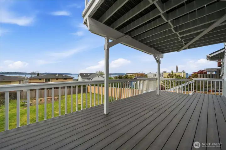 Expansive lower deck offers stunning views, generous entertaining space, and plenty of room for outdoor dining and lounge furniture.