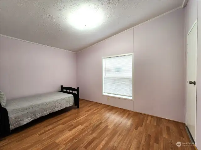 Wide angle view of bedroom 2 with walk in closet