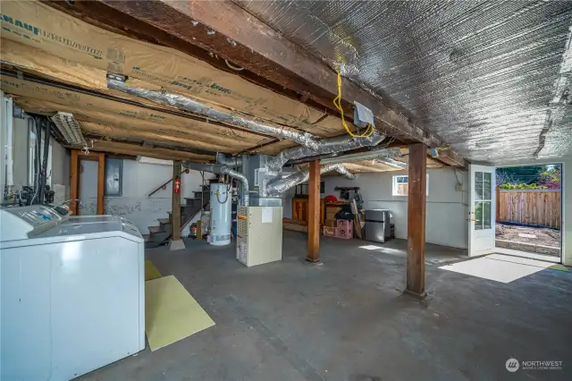 basement with laundry has separate entrance to the outdoors, could be converted to an ADU?