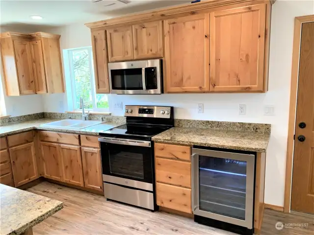 Beverage cooler on right side of stove