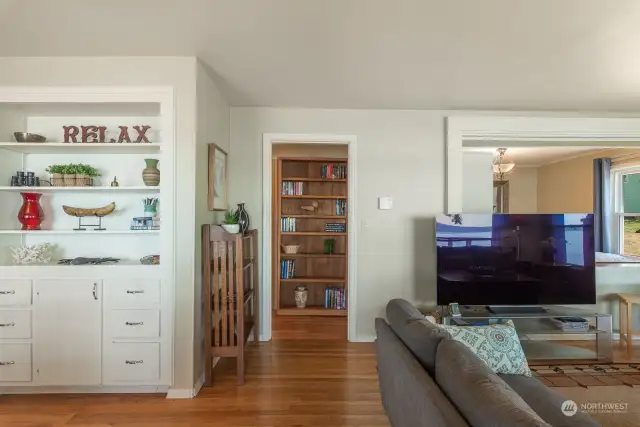 Built-ins add charm to this home that offers a view of the water from one of the bedrooms.