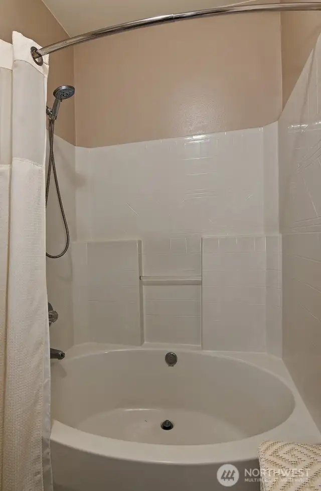 Large soaking tub in primary bath