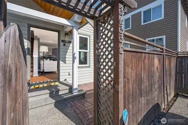 Best access is right off the alley where there are 2 parking spaces that leads to level entry.