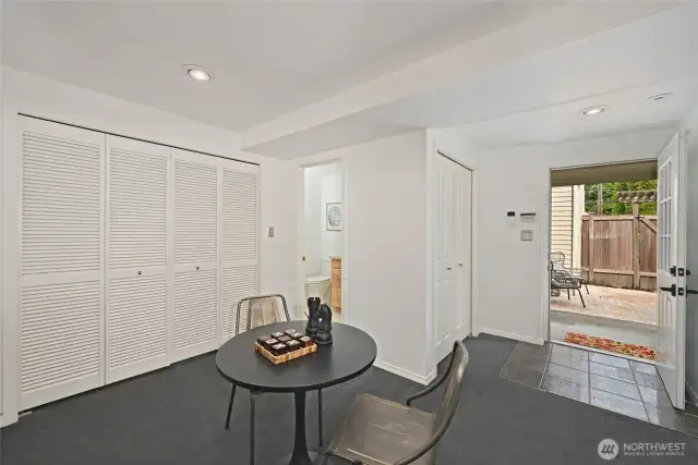 This daylight space has an exterior door that leads down to 22nd.