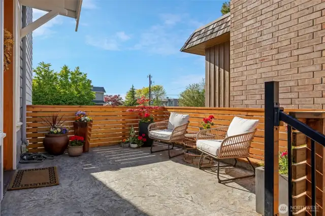 Large private patio as you come up the steps to the front door.