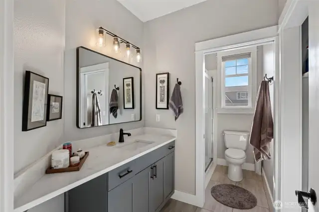 Guest bathroom/laundry is on the right.