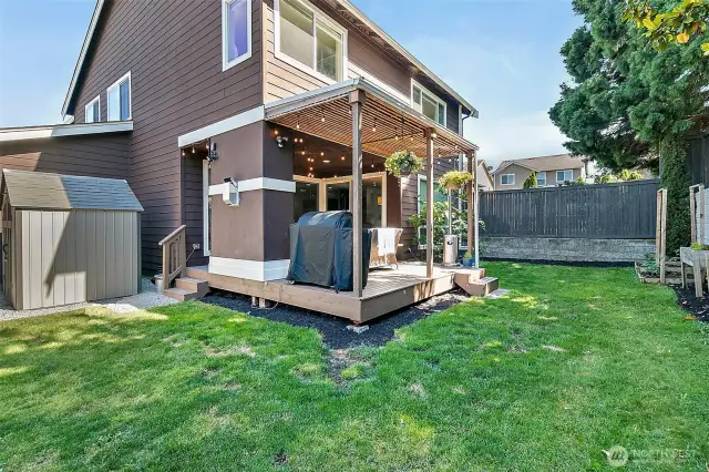 Cozy fully fenced in backyard.