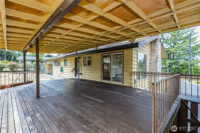 Huge covered deck offers year-round use and enjoyment