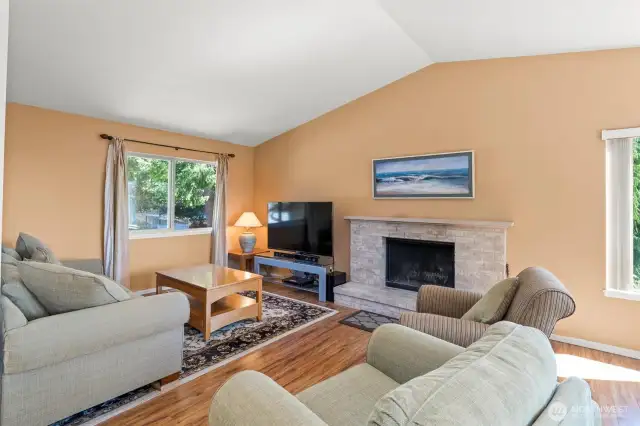Main Floor Living Room with Cozy Wood FP and Vaulted Ceilings