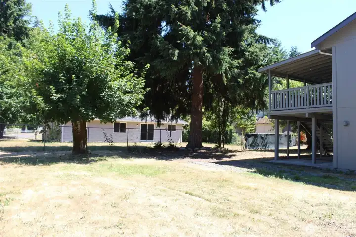 Plenty of room to park an RV or extra vehicles in the fenced yard.