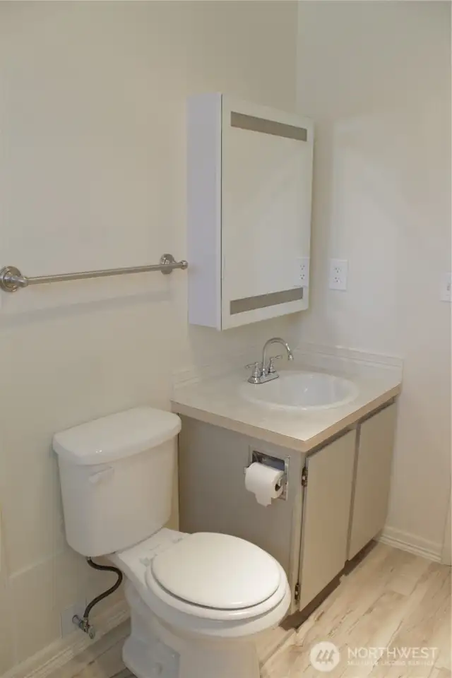 Half bathroom downstairs.