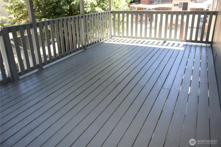 Huge covered deck off the upper level.