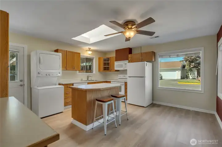 The kitchen come complete with all of your needed appliances