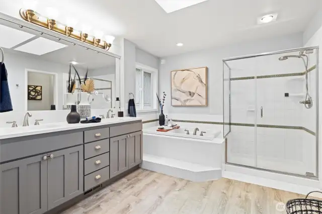 Retreat to your spa-inspired en suite with dual sinks, a soaking tub, and a walk-in shower. Your own slice of luxury!