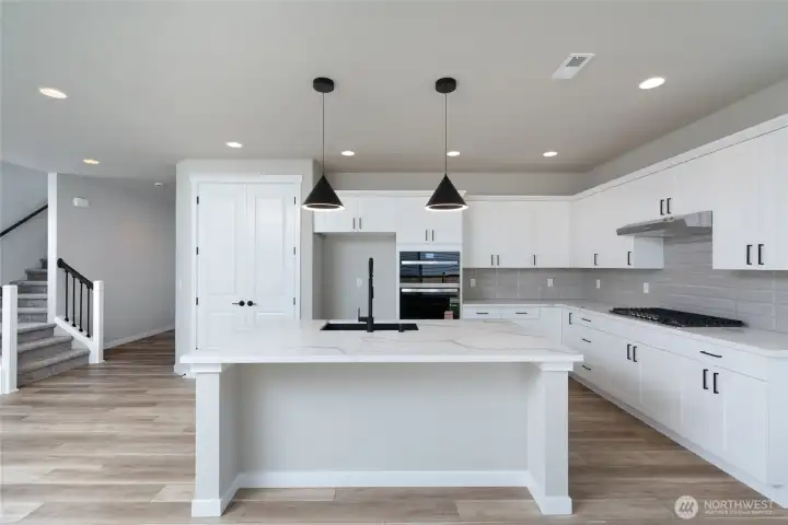 Photos are of a home in a different community and are for illustration purposes only to reflect typical finishes.  May depict seller enhancements.  Colors and options may vary.