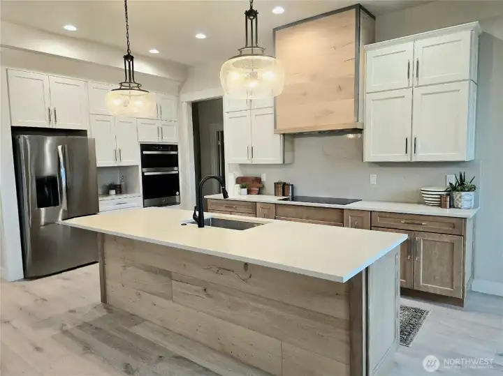 Nicely appointed kitchen with white oak accents