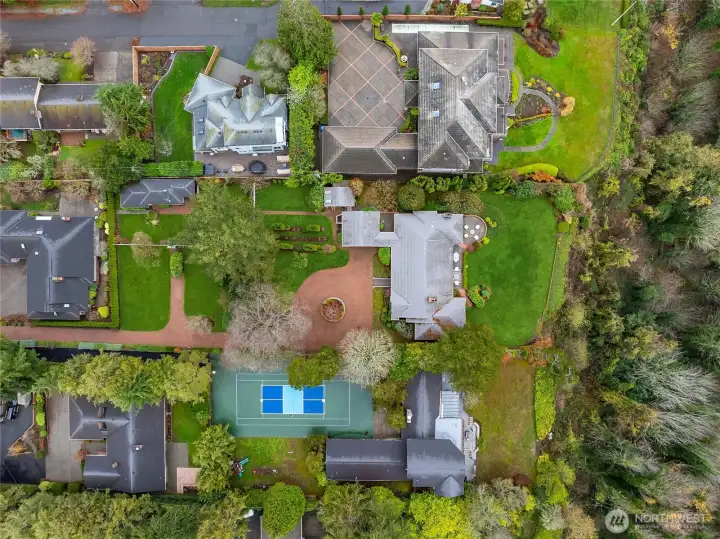 In this photo you get a good feel for the private drive, the gracious turnaround and the privacy of this special property!