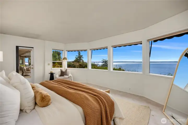 Master bedroom with forever views and also access to the patio.