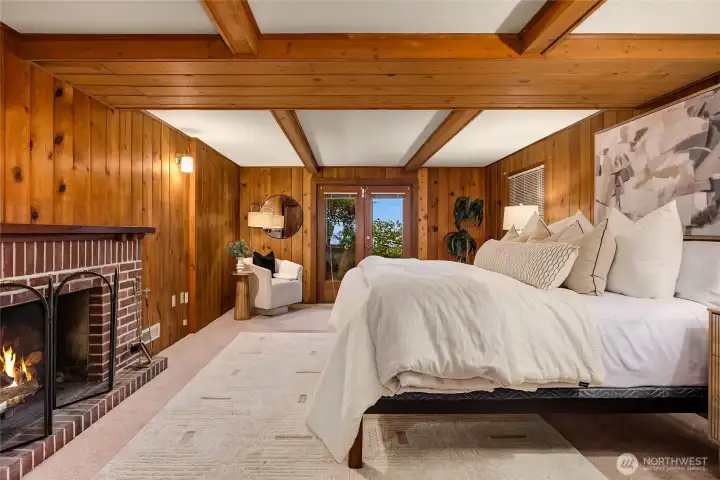 This room is staged as a bedroom (no closet), but could easily be a rec-room with a cozy fireplace and French door access to the backyard.