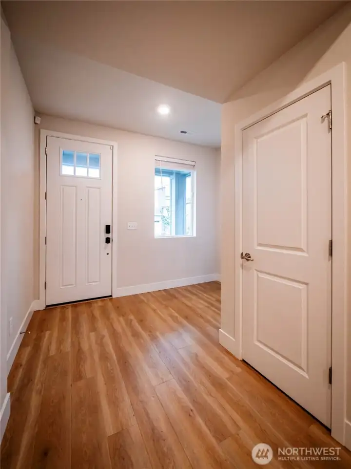 NICE AND WIDE ENTRY WAY WITH NOOK FOR KEYS AND SHOES...COAT CLOSET TO RIGHT