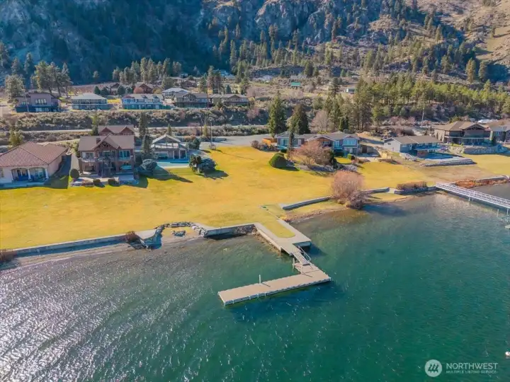 Community lawn, clubhouse, and dock