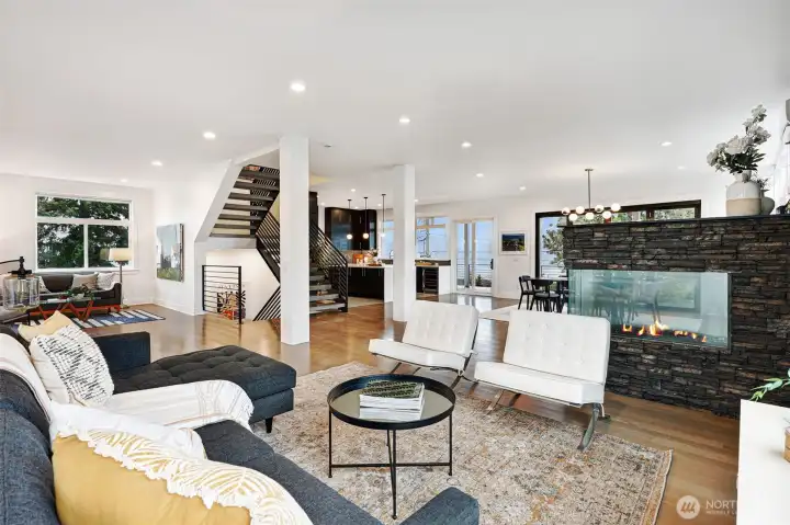 Spacious living room with fireplace and designer finishes