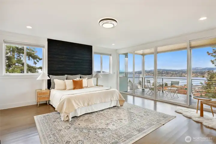 Primary bedroom with expansive lake views