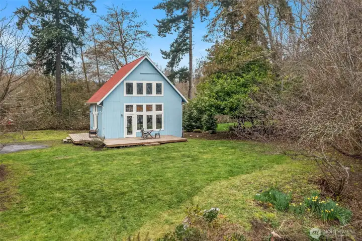 Set on .8 acres—a sunny, space with room to breathe.