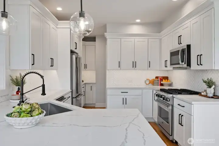 Remodeled kitchen with high end appliances.