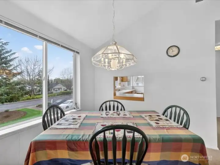 The dining room faces to the west and has a "pass through" to the kitchen. The dining room faces to the west and has a "pass through" to the kitchen.
