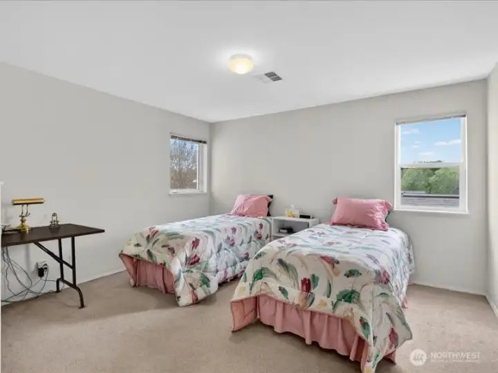 The primary suite is also off the hallway and is very large. The primary suite is also off the hallway and is very large.