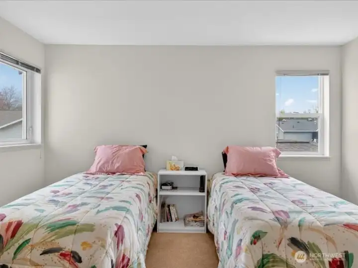 The primary suite faces to the north and the west. The primary suite faces to the north and the west.