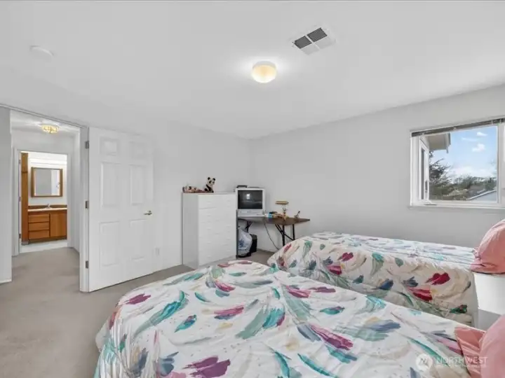 The full bath is across the hallway from the primary suite. The full bath is across the hallway from the primary suite.