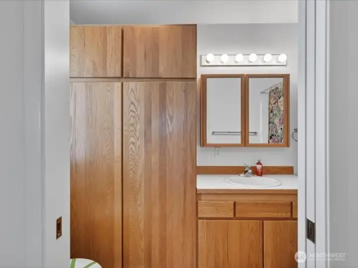 Looking at the vanity and storage cabinets at the primary bath. Looking at the vanity and storage cabinets at the primary bath.