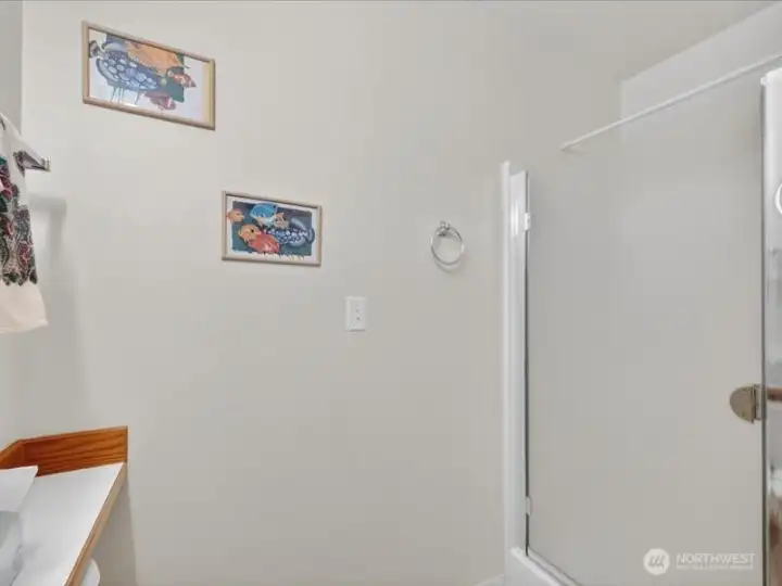 There is a lovely oversized shower with a glass door at the 3/4 bathroom. There is a lovely oversized shower with a glass door at the 3/4 bathroom.