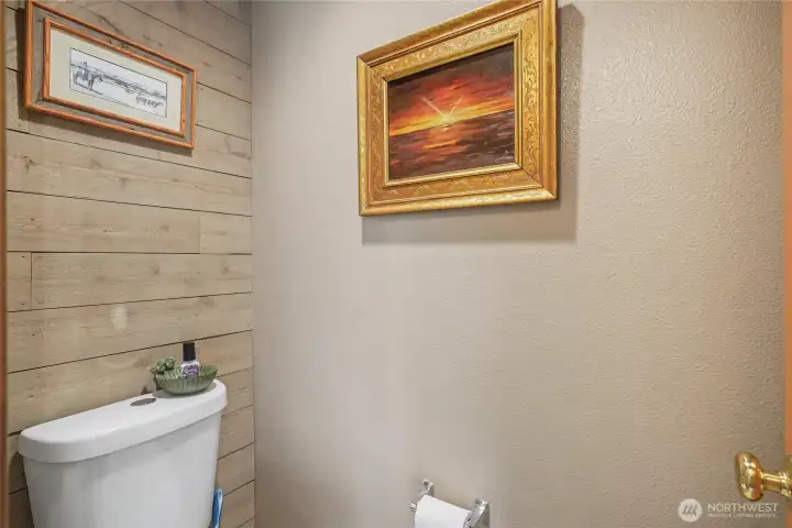 View of your powder room, located between the kitchen and garage entrance.