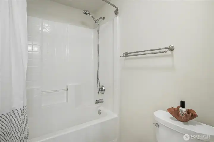 Kids/guest full bath view two, I love that the shower and toilet are located in a separate space.