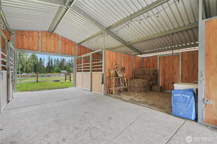 Right side view of your barn showing another paddock, hay storage area, tack room to your right.