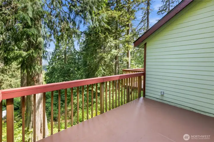 Peaceful outlooks of mature evergreens and surrounding natural beauty create a sense of privacy and retreat.