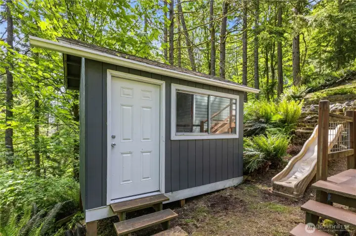 Detached storage shed provides additional room for tools, gear, outdoor equipment, or seasonal storage.