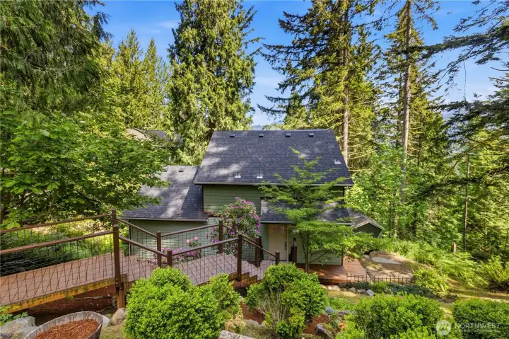 Welcome to your private Pacific Northwest retreat surrounded by towering evergreens and peaceful natural scenery.