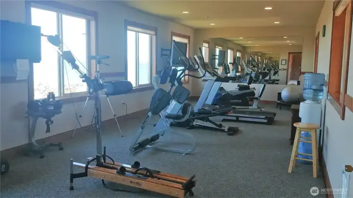 Exercise room with lots of equipment