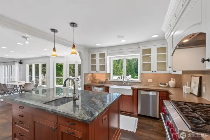A kitchen designed to impress with high-end appliances that elevate everyday cooking and under-cabinet lighting that enhances the workspace and the view.....