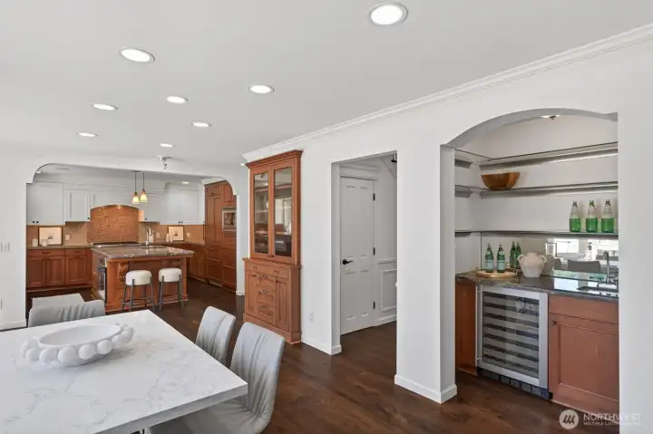Convenient wet bar for entertaining guests. The built-in beverage refrigerator adds functionality.